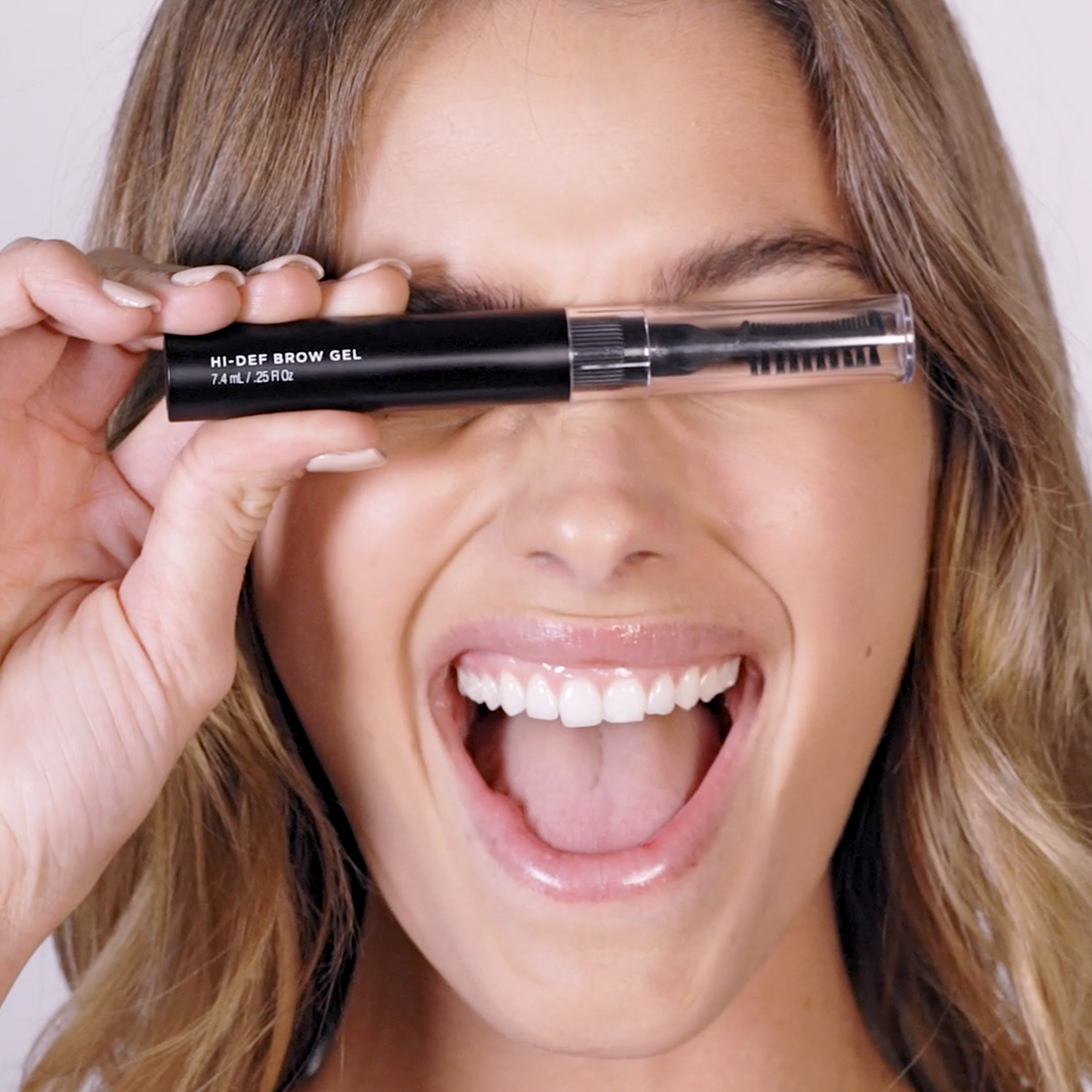 Image of model holding up Hi-Def Brow Gel