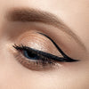 Close up image of eye with graphic shaped eyeliner