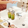 Image of sink counter with a woman going through her routine 