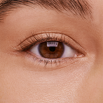 Close up image of model's eye before applying Double-Ended Volume Set